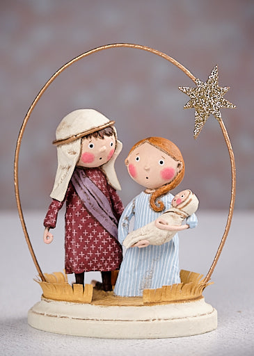 Lori Mitchell nativity figurine set with Mary, Joseph, baby Jesus, and gold star arch