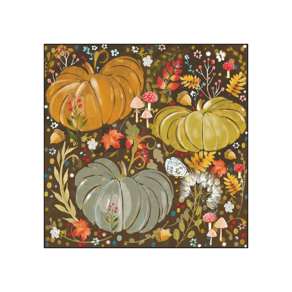 Cocktail napkin featuring three pumpkins with autumn florals, mushrooms, and leaves on dark brown background
