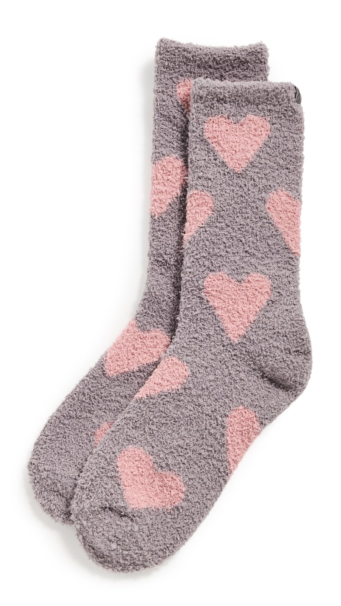 Barefoot Dreams Cozy Chic gray fuzzy socks with pink heart print pattern, pair shown flat