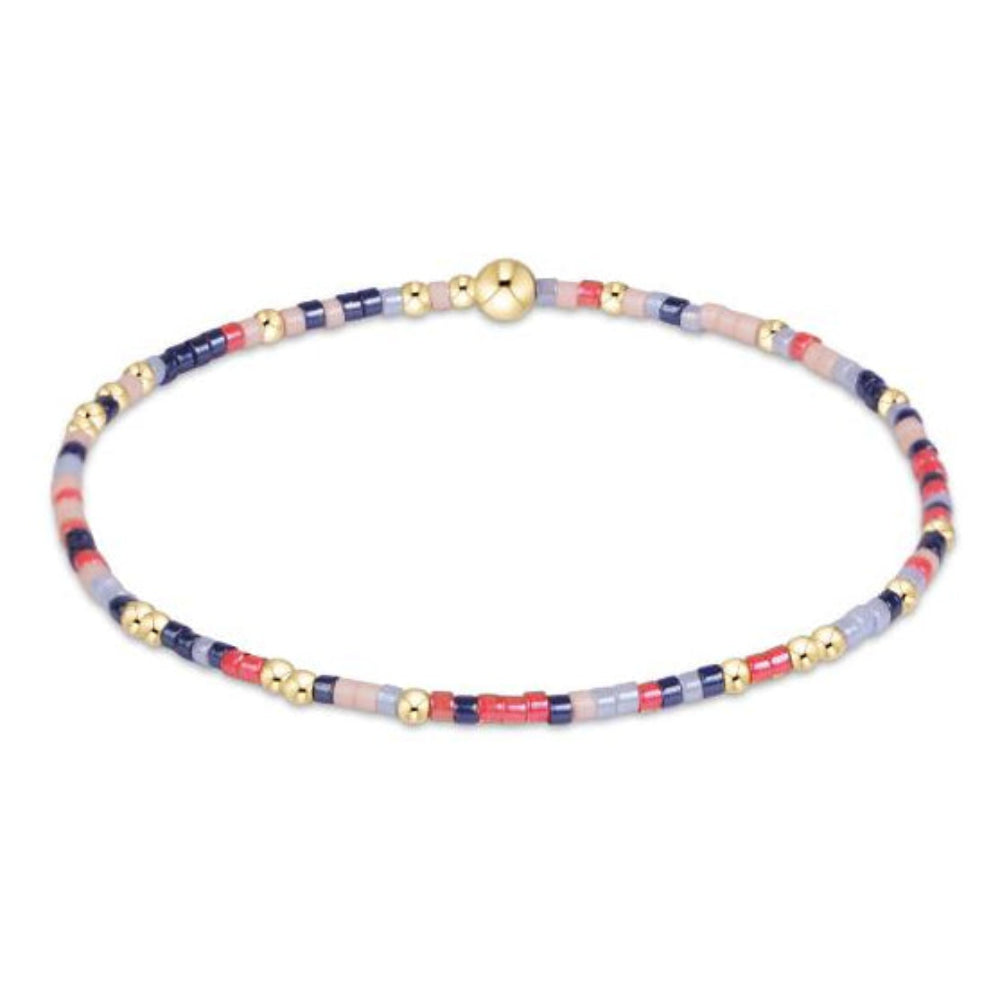 eNewton Hope Unwritten beaded stretch bracelet in navy, coral, and lavender with gold beads