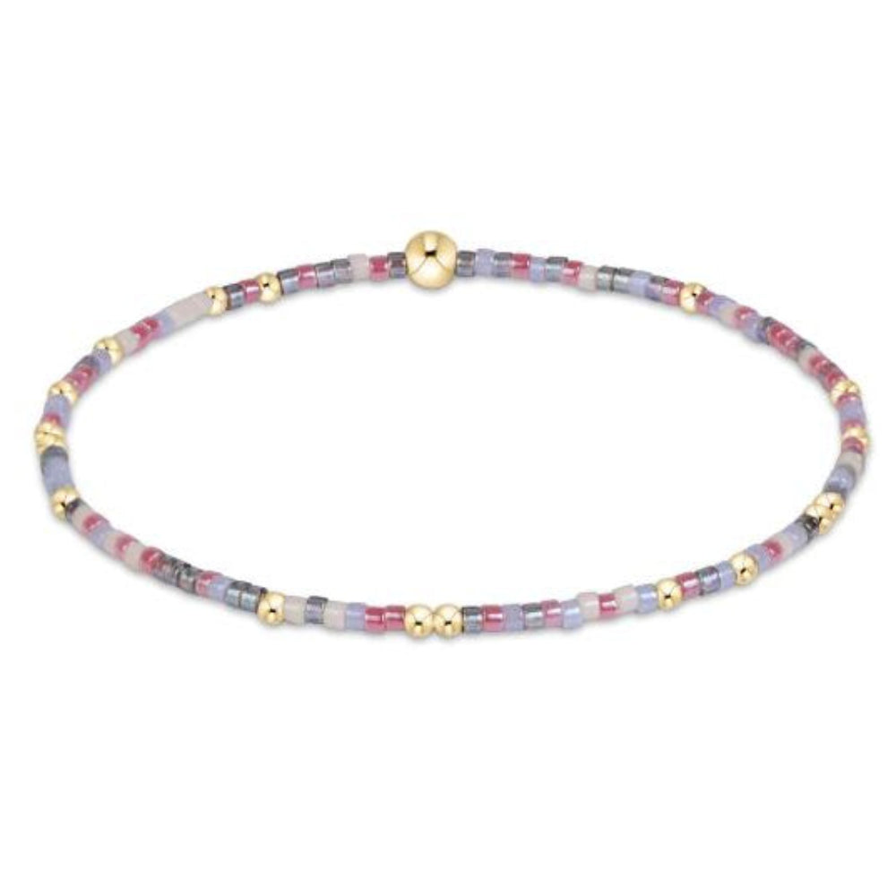 eNewton Hope Unwritten bracelet with multicolor seed beads in lavender, pink, grey, and gold accents