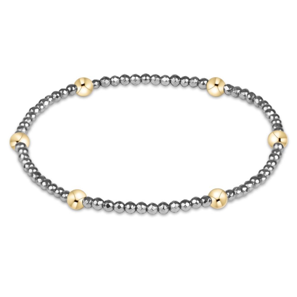 eNewton Presence Silver Faceted Hematite 2mm Bracelet with gold accent beads on white background
