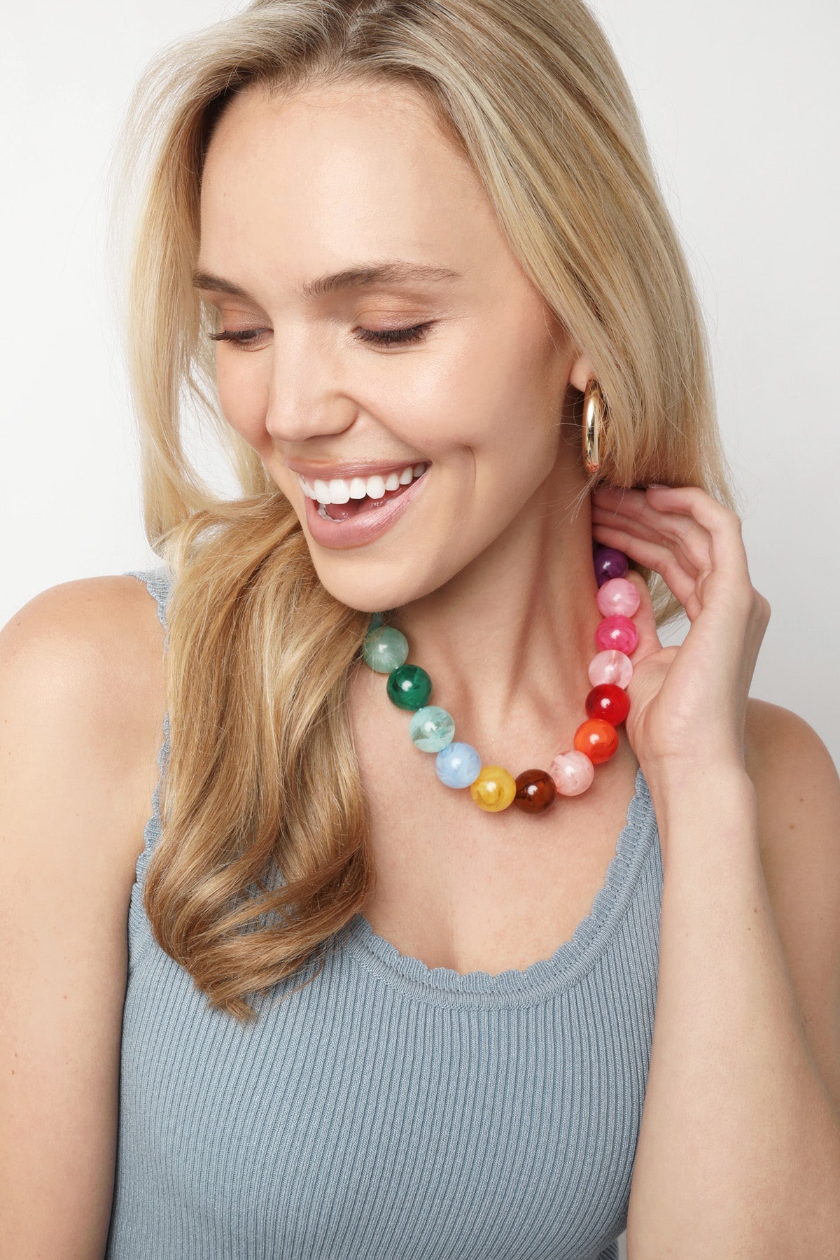 Model wearing Canvas Style Mickey Gumball Beaded Necklace with large colorful rainbow multi beads