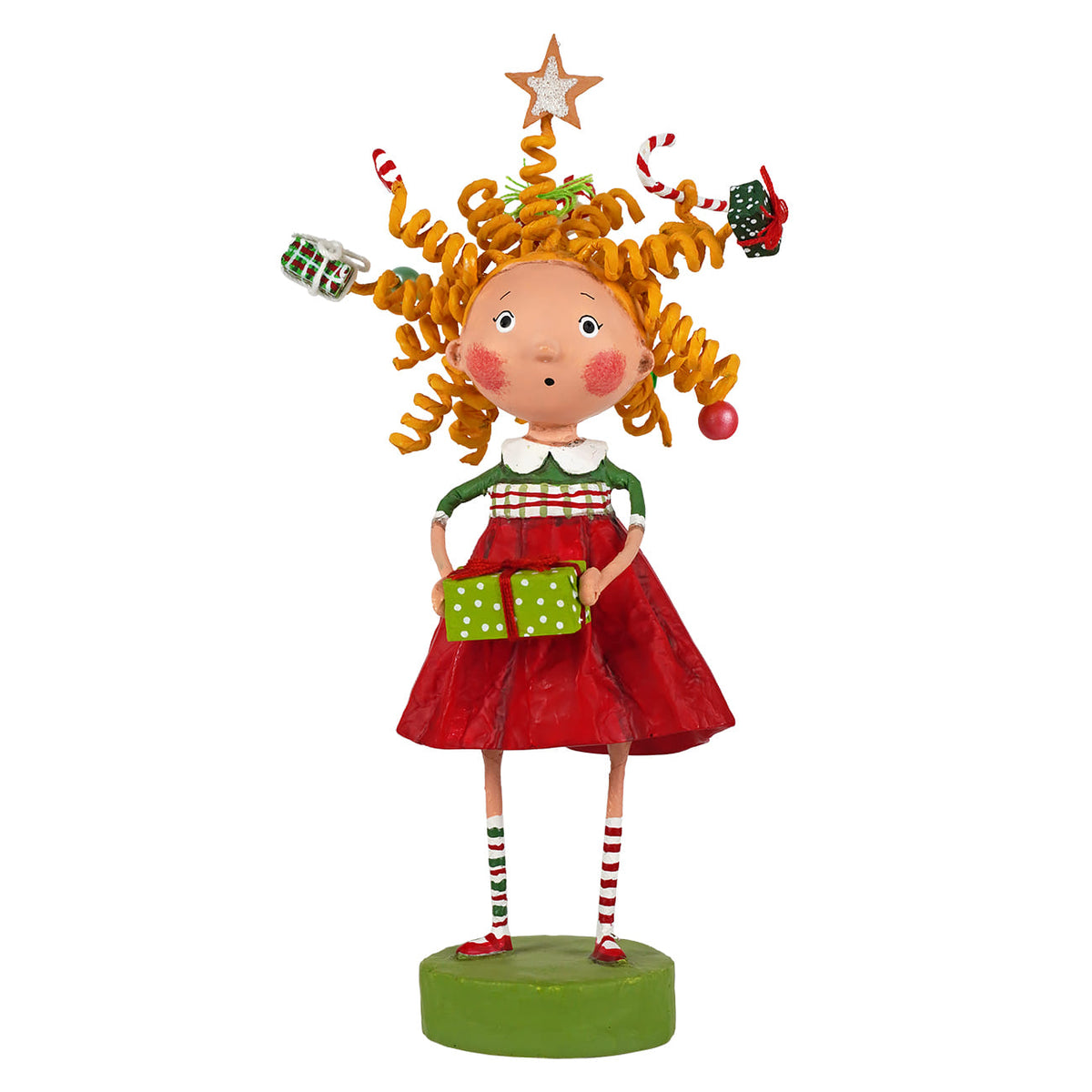 Lori Mitchell Gabby Giftmas figurine girl with curly orange hair decorated with Christmas ornaments holding gift