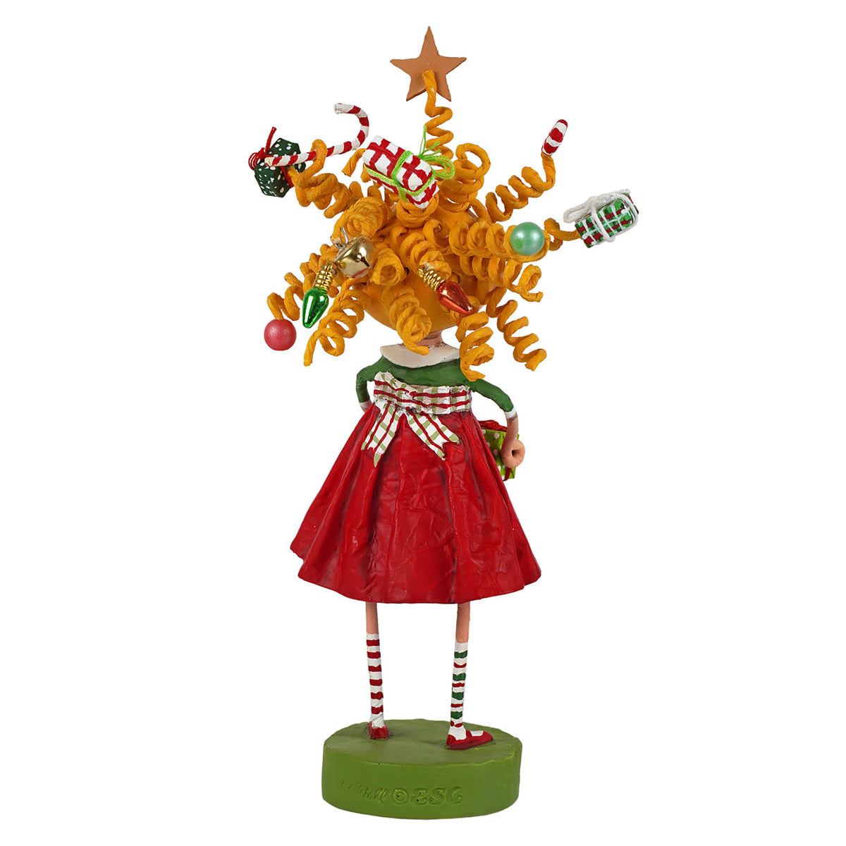 Back view of Gabby Giftmas figurine with curly orange hair adorned with Christmas ornaments and star topper