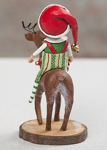 Back view of Run Run Reindeer figurine showing elf rider in Santa hat on brown reindeer