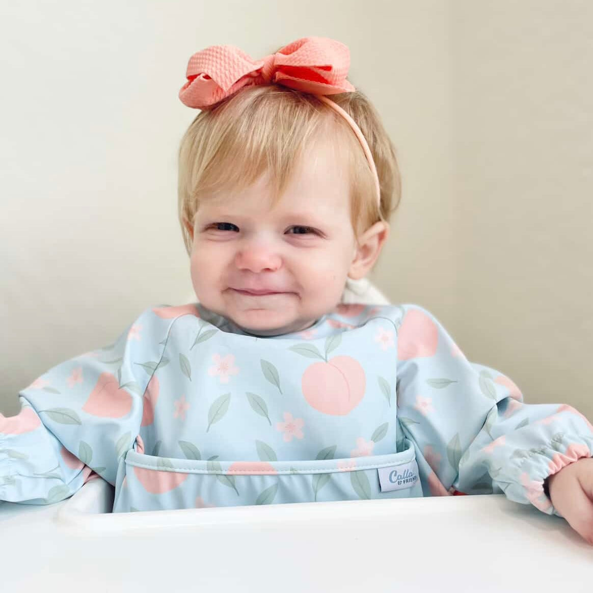 THE GRAYSON LONG SLEEVE BIB-PEACH BLOSSOM 6-36M