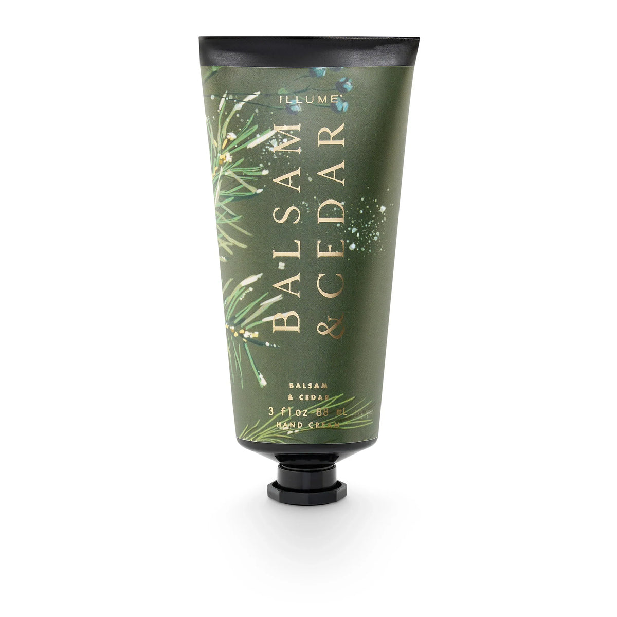 Illume Balsam and Cedar hand cream tube in dark green with gold lettering, 3 fl oz