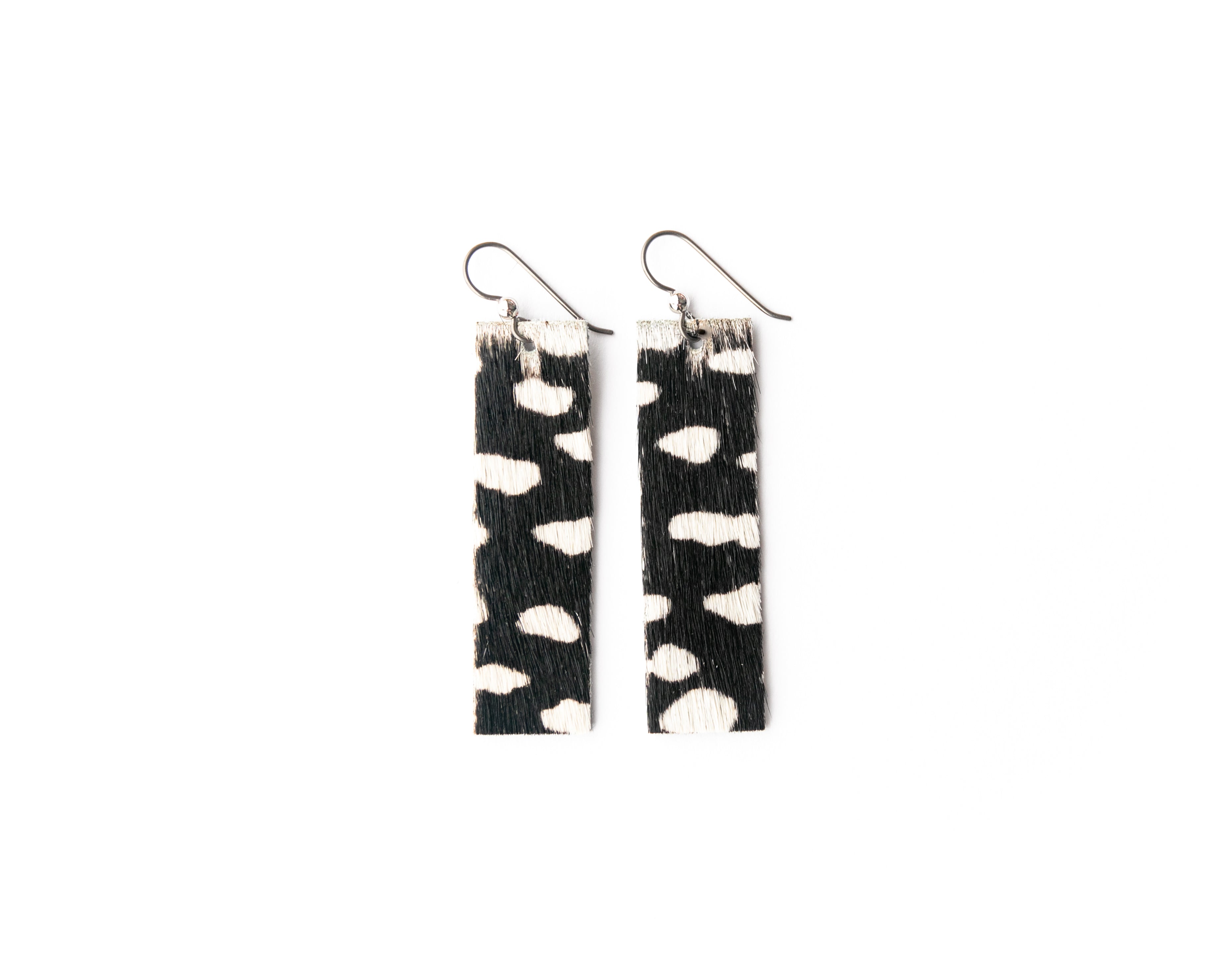 SPOTTED IN WHITE FOUR CORNER LEATHER EARRINGS