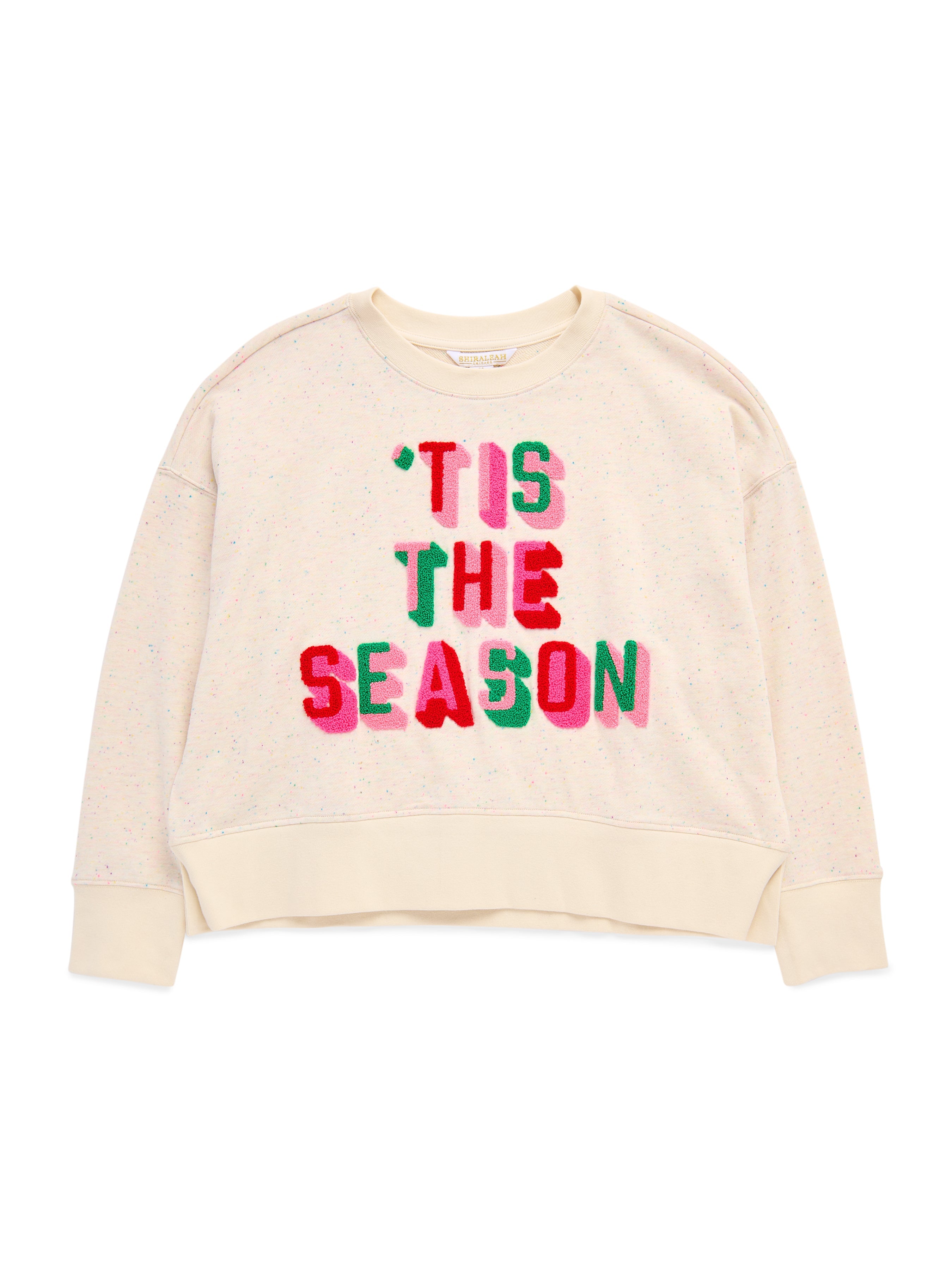 Cream relaxed sweatshirt with colorful 'Tis The Season chenille lettering in pink, green, and red