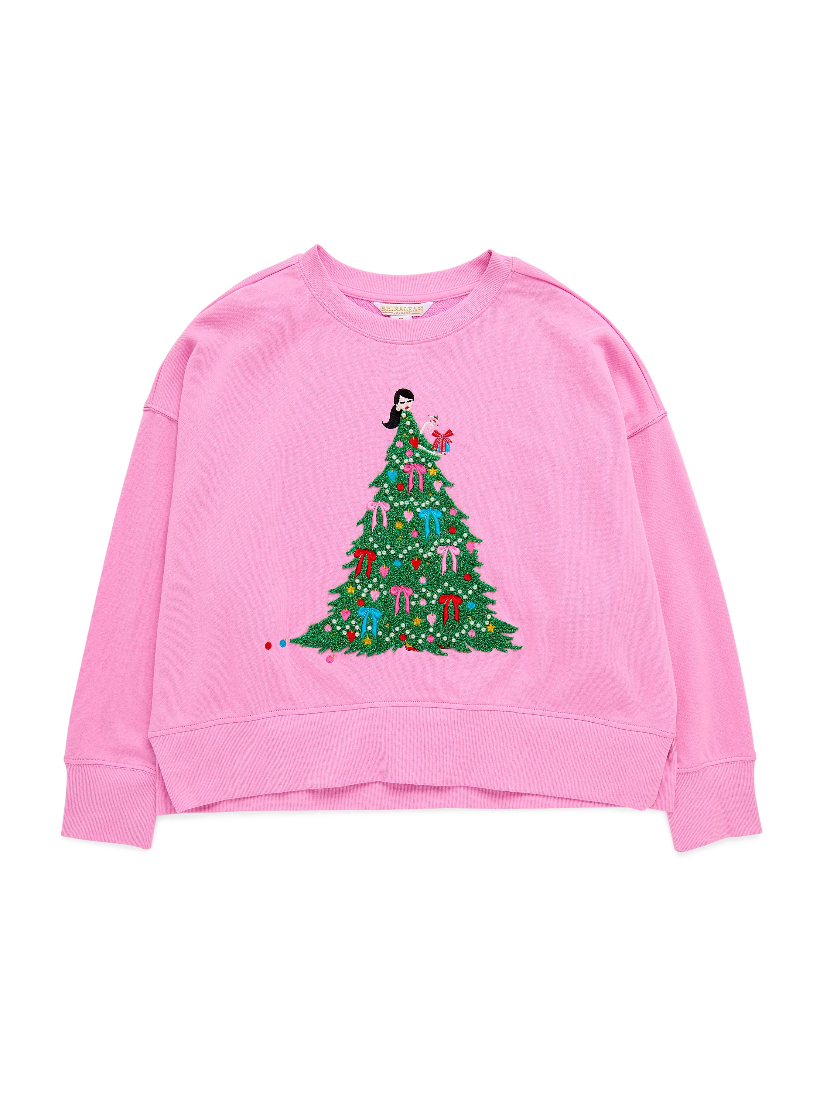 Pink relaxed sweatshirt with embroidered Christmas tree and lady graphic by Shiraleah
