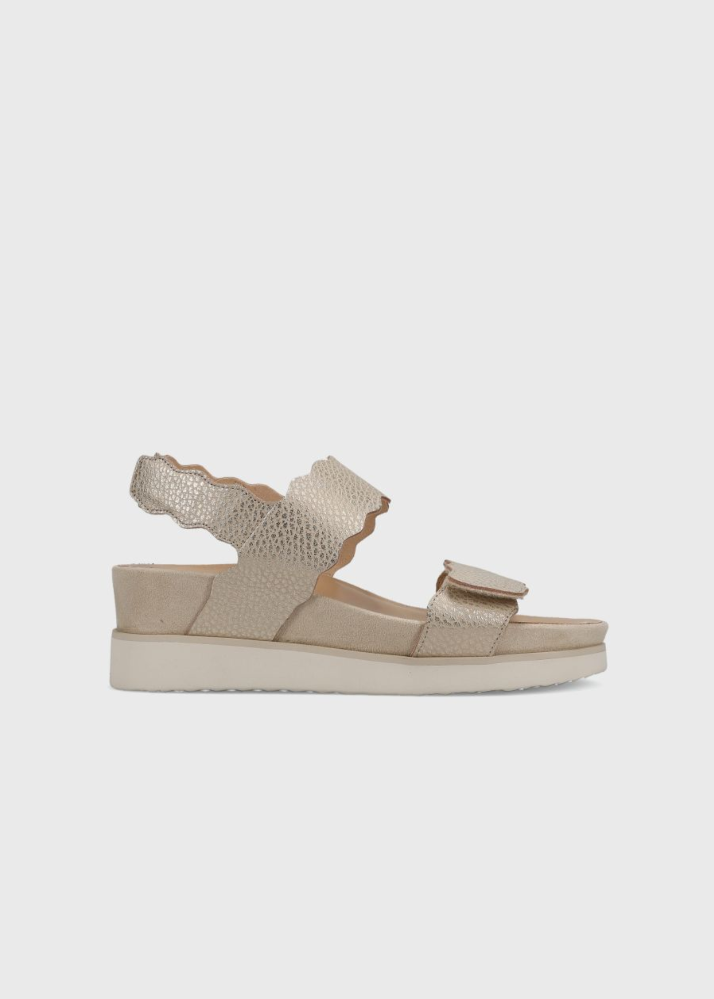 VanEli Ulani sandal in platino metallic leather with scalloped straps and white sole, side view
