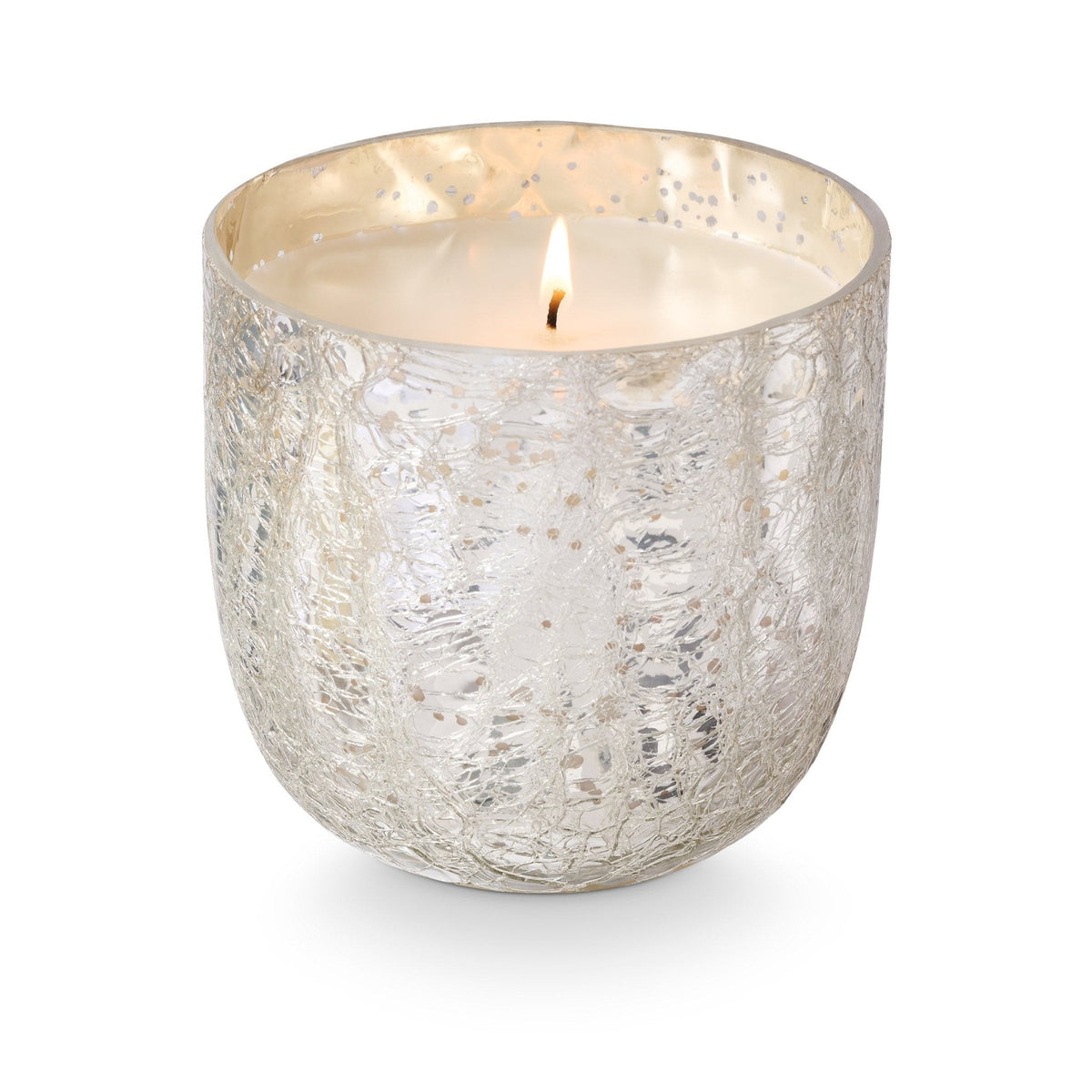 ILLUME Balsam & Cedar large crackle glass candle in silver with single lit flame