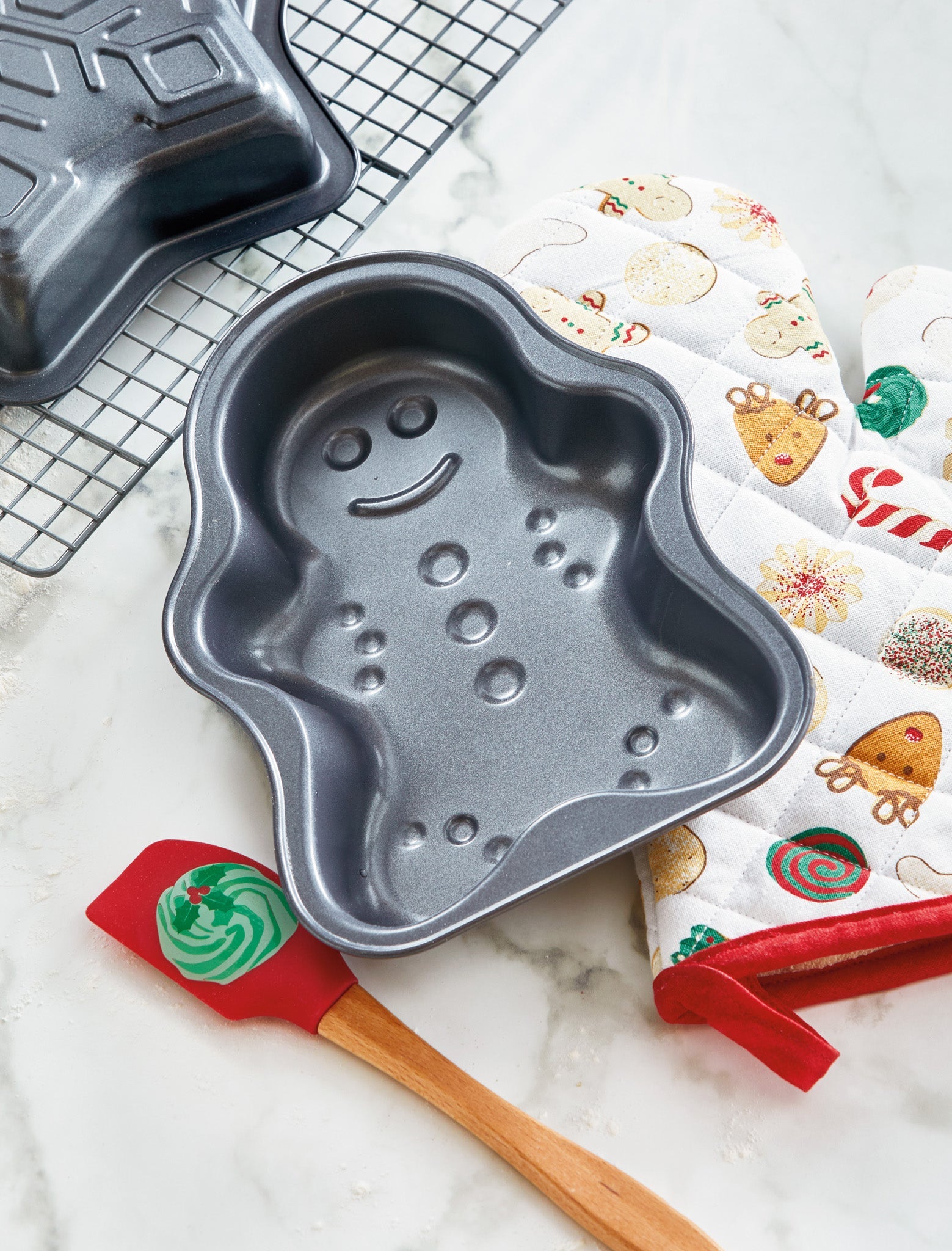 TAG gingerbread man shaped 9-inch non-stick cake pan with holiday oven mitt and spatula