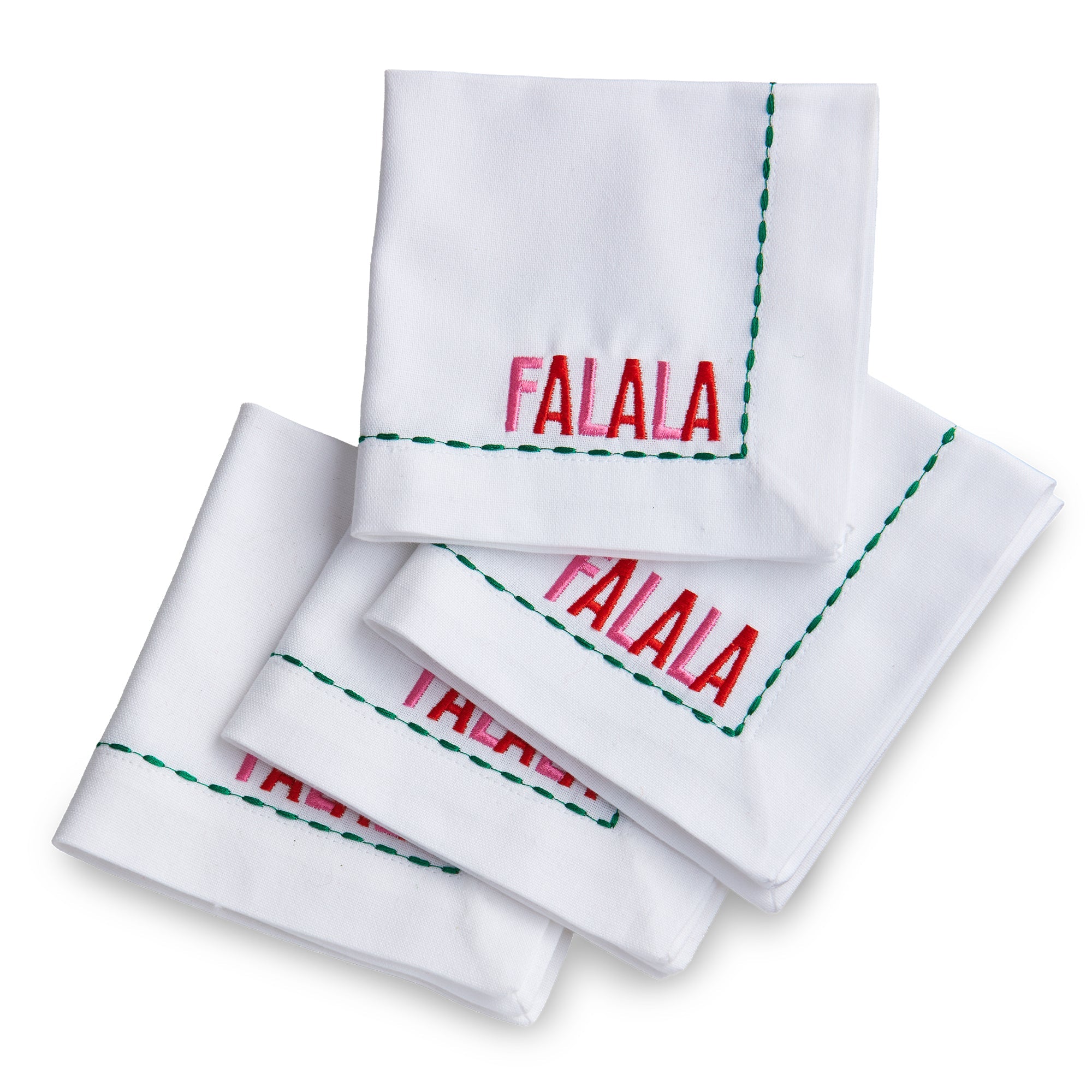 Set of four white linen cocktail napkins with FALALA embroidery and green stitched border