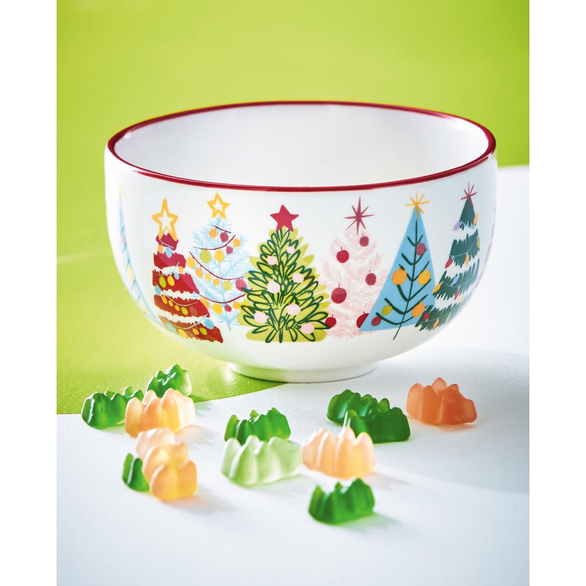 TAG Groovy Trees white ceramic cereal bowl with colorful Christmas tree pattern and red rim