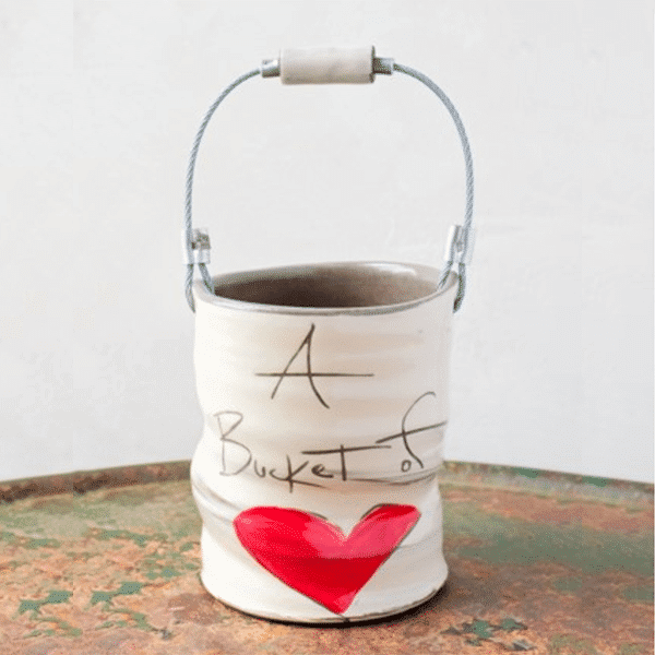 Small white ceramic bucket with wire handle, inscribed 'A Bucket of Love' with red heart