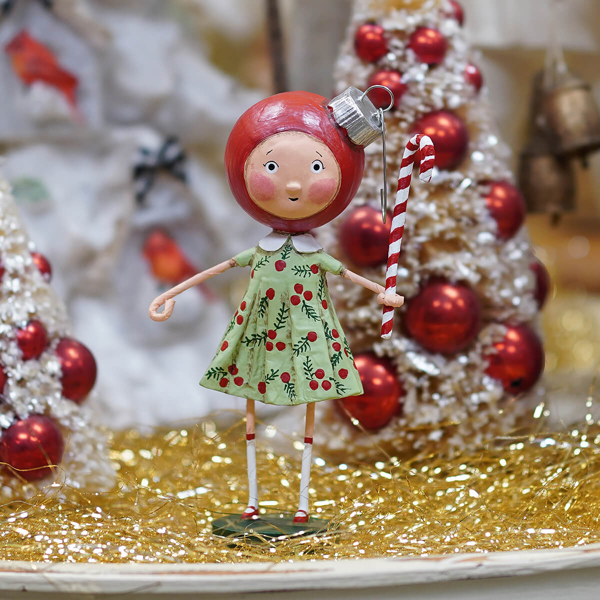 Lori Mitchell Betsy Bauble figurine in green holly dress holding candy cane