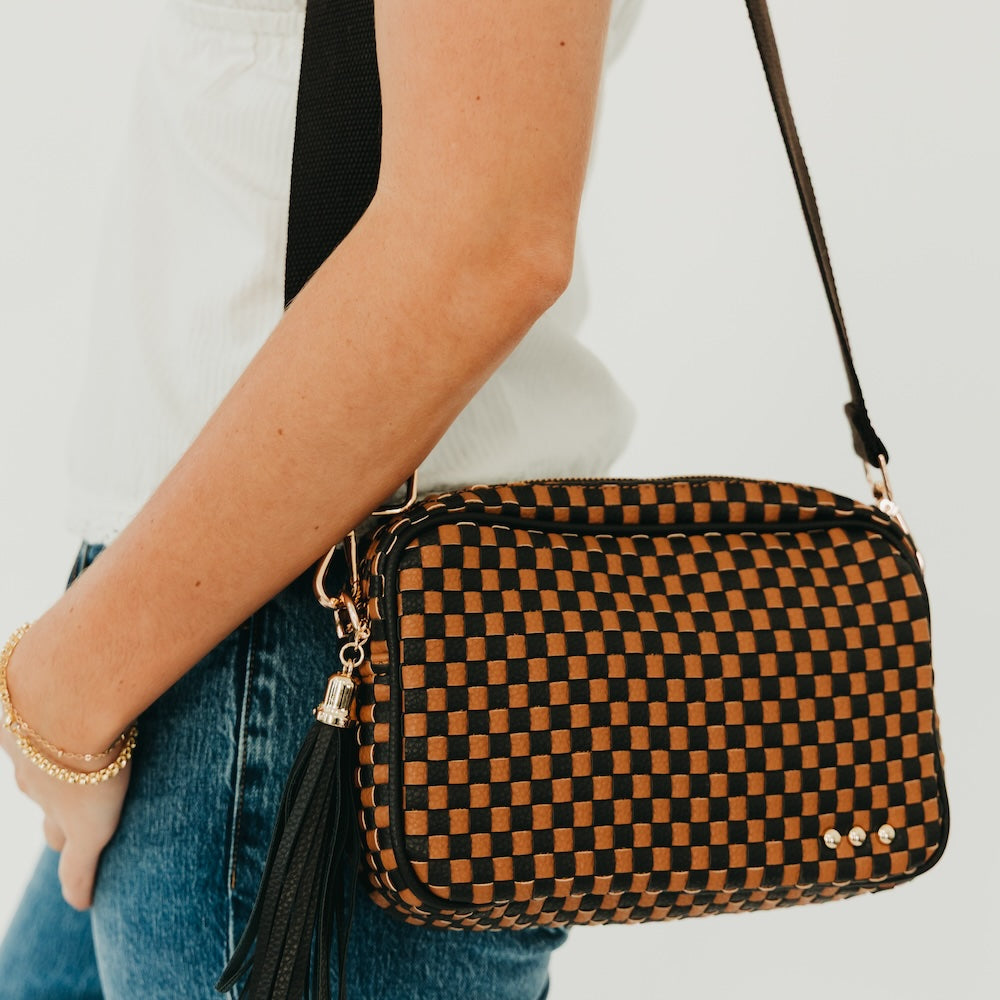 Pretty Simple Woven Willow Camera Crossbody Bag in checkered coffee pattern worn crossbody